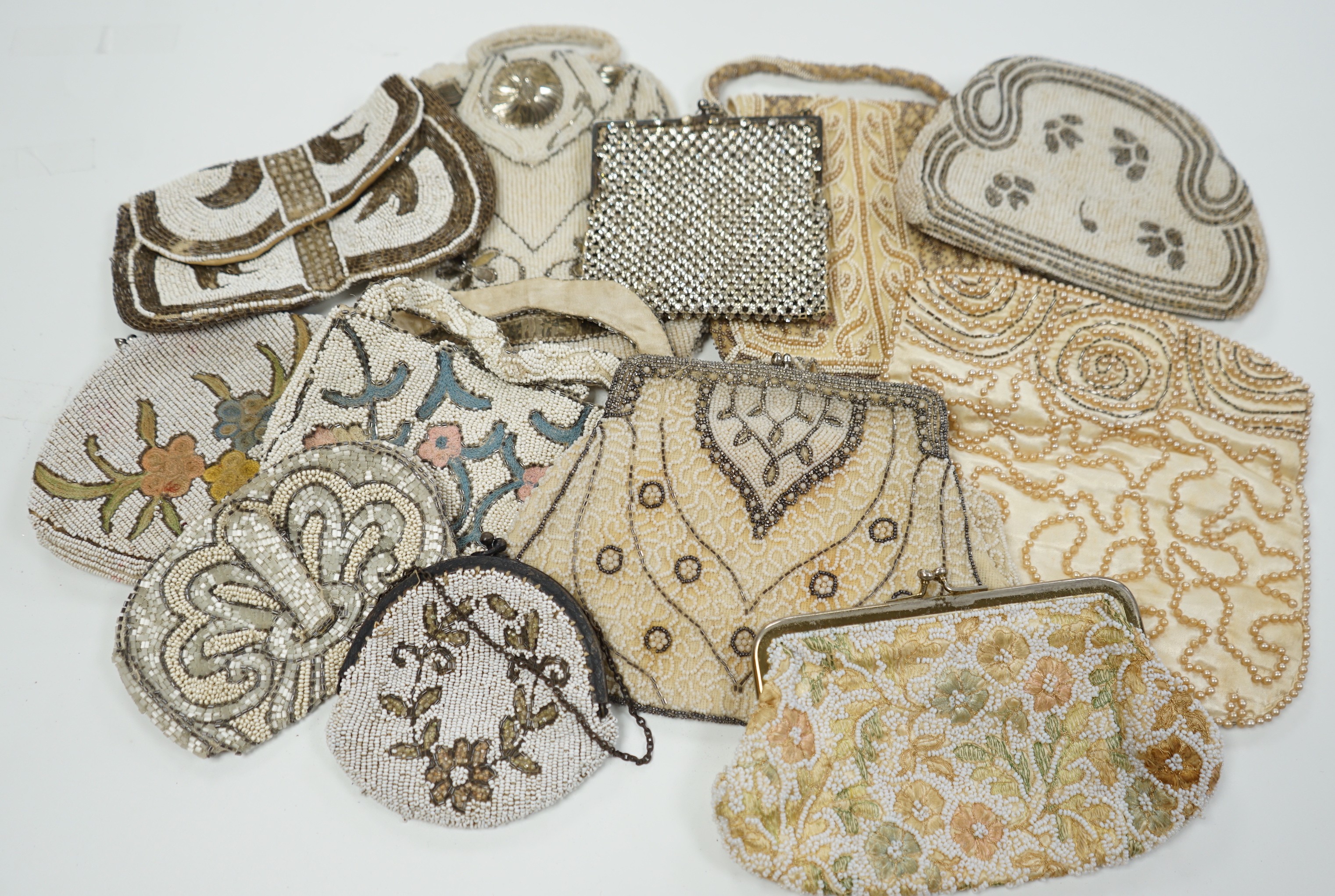 Twelve 1930’s beaded, sequin and pearl evening clutch bags and bags, some with embroidered decoration